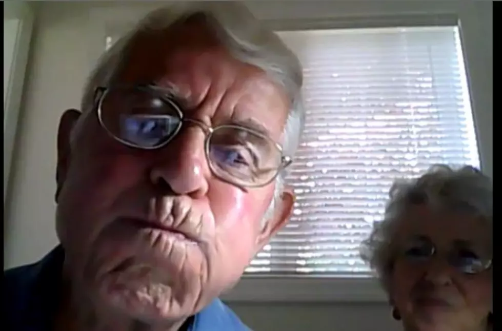 Senior Couple Learning About Their New Webcam